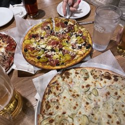 Pagliai's Pizza - Pizza in the back is the Pesto Pepperoni