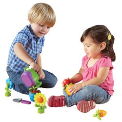 Treasure Garden Childcare Center - Playing and learning in their own treasure garden