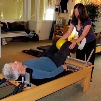 The Pilates Studio - Footwork on the Reformer - Pilates Near Me - Hadley, Massachusetts