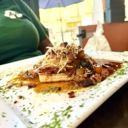 Cruzian Bayou Bistro - French Toast with Mango Rum sauce and a fried egg