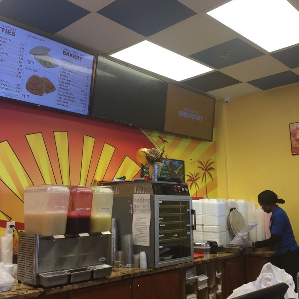 Golden Krust - Taking the time to look at the menu before making my order - Caribbean Near Me - Morrow, Georgia Golden Krust - Taking the time to look at the menu before making my order - Caribbean Near Me - Morrow, Georgia