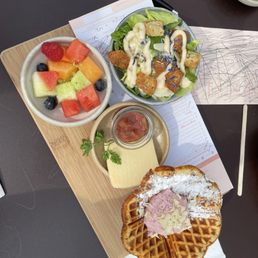 Poppyseed waffle, cheese, salad, sugared fruit.