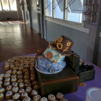 Icing on the Cakes - The leaning tower of wedding cake. $1000 cake with no structural support. Clearly this was worth every penny. - Desserts Near Me - Kitty Hawk, North Carolina