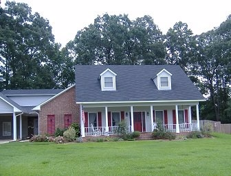 Slide of CMHI Roofing and Construction