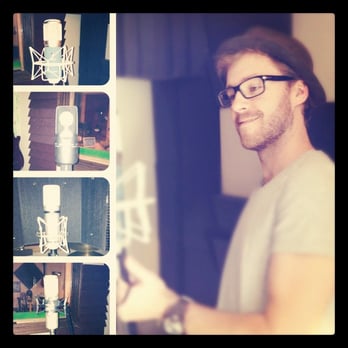 Milestone Studios - Wes picking out a mic. - Recording & Rehearsal Studios Near Me