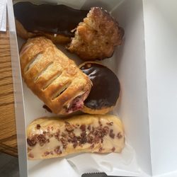 Drew's Donut Stop - The donuts I bought.  Yes, that's a maple bacon long John!