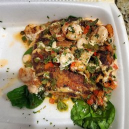 a meal in a styrofoam container