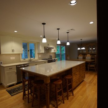 Rosa Home Improvement - Quartz Countertop: Chakira Beige, Subway backsplash: Anatolia Marlow Paint finish cabinets with maple island - General Contractors Near Me - Wolcott, Connecticut