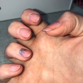 Iris Nails & Spa - You can see the darkness on the tips of my nails - Nail Salons Near Me - Germantown, Maryland