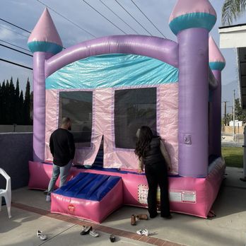 Blue Kangaroo Party Rentals - Pink bounce house - Bounce House Rentals Near Me