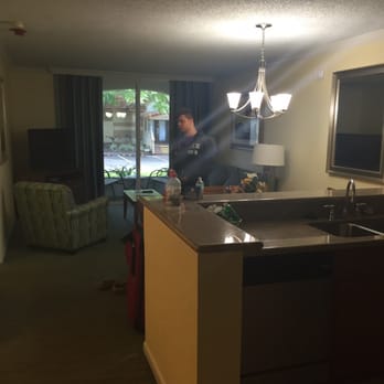 Blue Tree Resort - Pic of kitchen looking into the living room. Enclosed/screened porch beyond living room. - Resorts Near Me - Lake Buena Vista, Florida