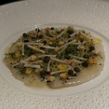 Le Bernardin - Fluke - Flash Marinated Fluke; Mini Capers and Croutons; "Brown Butter Vinaigrette" - French Near Me - New York, New York Le Bernardin - Fluke - Flash Marinated Fluke; Mini Capers and Croutons; "Brown Butter Vinaigrette" - French Near Me - New York, New York