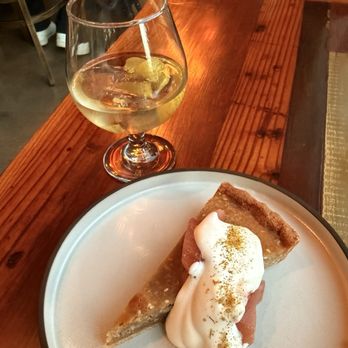 Odd Duck - Grand Finale ... Frangipane Tart with Tximista Blanco Basque Vermouth. - American Near Me - Austin, Texas