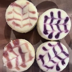 Lemon raspberry and lemon blueberry mini cheesecakes