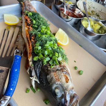 Laser Wolf - Whole Branzino w/ Ginger & Tomato - Middle Eastern Near Me - Brooklyn, New York Laser Wolf - Whole Branzino w/ Ginger & Tomato - Middle Eastern Near Me - Brooklyn, New York