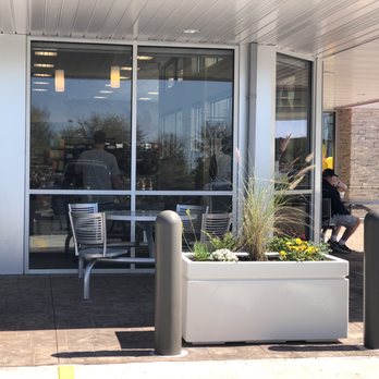 Wawa - Outdoor patio, I hope they are ready for all the teens in the area! - Gas Stations Near Me - Jacksonville, Florida