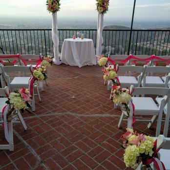 Pennie's Bloomers - Ceremony aisle with a view and gorgeous pink & white flower sprays and vases - Floral Designers Near Me