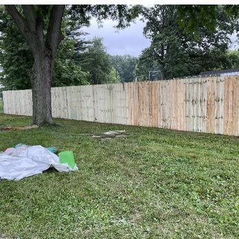 Davin’s Construction - a fence that has been painted - Fences & Gates Near Me