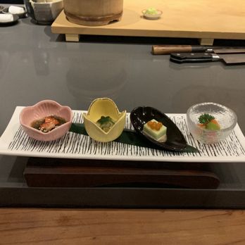 Hinata - appetizers (left to right): seaweed and strawberry, oyster with ponzu jelly, edamame tofu, cherry tomato - Sushi Bars Near Me - San Francisco, California
