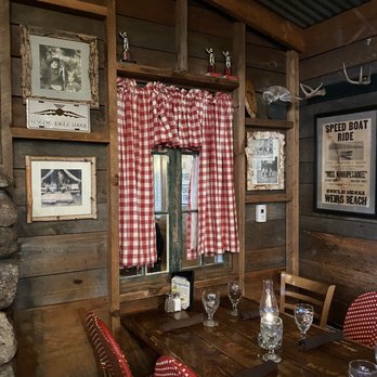 Camp - a rustic dining room with red and white gingham curtains - New American Near Me - Meredith, New Hampshire