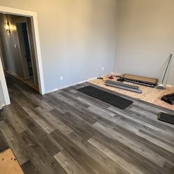 Wood Bros Floor Coverings - Wood Bros. luxury vinyl planking being installed