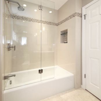 Best Remodeling Contractors - a bathtub and shower - General Contractors Near Me