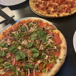 Build your own veggie pizza, pepperoni in the back