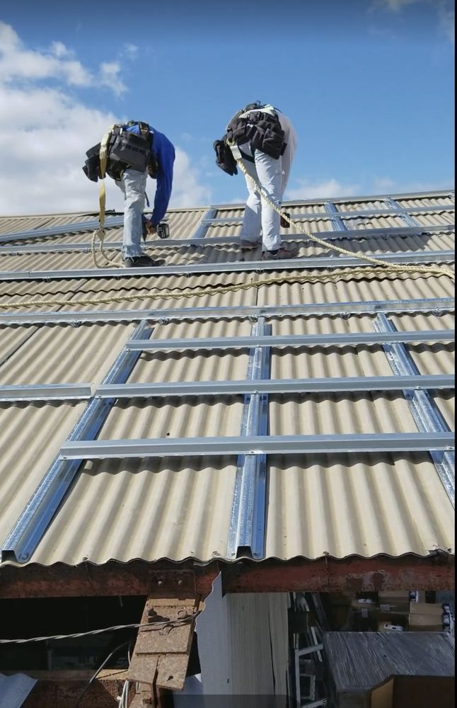 Slide of Action Roofing Hawaii