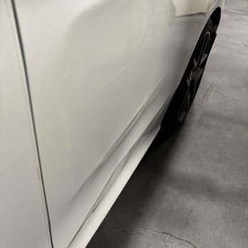 Supreme Smart Repairs - Before: Shallow dent (Top) and long crease dent along the body line (Bottom) - Mobile Dent Repair Near Me Supreme Smart Repairs - Before: Shallow dent (Top) and long crease dent along the body line (Bottom) - Mobile Dent Repair Near Me