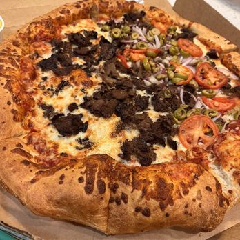 Marco's Pizza - Half steak and half steak, green olives, tomatoes, and red onions - Pizza Near Me - Longwood, Florida Marco's Pizza - Half steak and half steak, green olives, tomatoes, and red onions - Pizza Near Me - Longwood, Florida