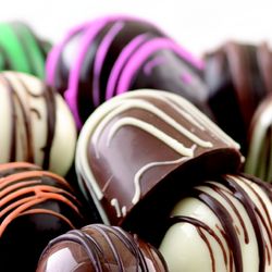 Belladonna Florist & Flower Delivery - Locally made for 4 generations Abdallah Candies & Chocolates are right at home with our flowers!