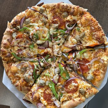 Freshslice Pizza - a sliced pizza on a table - Pizza Near Me - Tsawwassen, British Columbia Freshslice Pizza - a sliced pizza on a table - Pizza Near Me - Tsawwassen, British Columbia