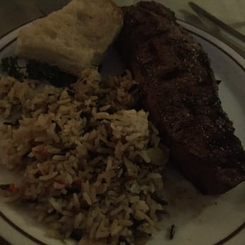 The Hitching Post 2 - Sorry bad lighting. 10oz New York strip and rice pilaf - Steakhouses Near Me - Buellton, California
