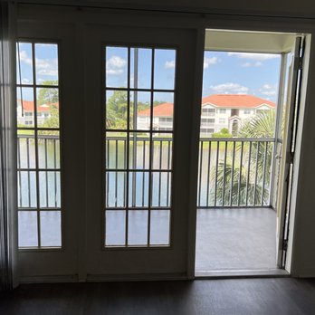 Ashlar - Living room to the balcony - Apartments Near Me - Fort Myers, Florida Ashlar - Living room to the balcony - Apartments Near Me - Fort Myers, Florida