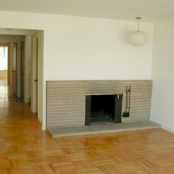 Lee Floor Sanding - a fireplace in a living room - Flooring Near Me - Oakland, California Lee Floor Sanding - a fireplace in a living room - Flooring Near Me - Oakland, California