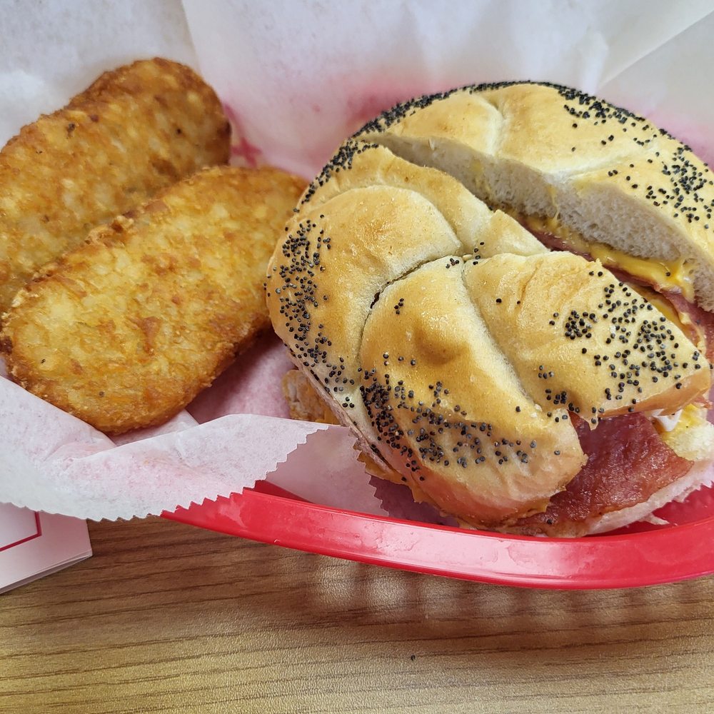 Pork Roll Petes - Pork roll, egg and cheese on a hard roll (seeded - you can get plain too) and 2 hashbrowns. - Bagels Near Me - Bradenton, Florida Pork Roll Petes - Pork roll, egg and cheese on a hard roll (seeded - you can get plain too) and 2 hashbrowns. - Bagels Near Me - Bradenton, Florida