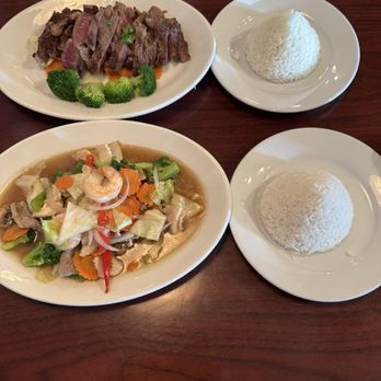 Sabai Thai Cuisine - Crying Tiger Ribeye Steak over Veggies and Stir Fry Veggies with Combo Meat - Thai Near Me - Semmes, Alabama Sabai Thai Cuisine - Crying Tiger Ribeye Steak over Veggies and Stir Fry Veggies with Combo Meat - Thai Near Me - Semmes, Alabama