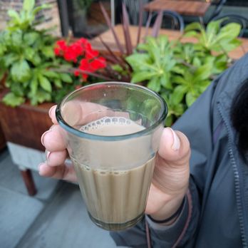 Dishoom - Waiting outside in cold they give you some lassi - Indian Near Me - London, XGL