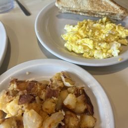 Eggs and toast, home fries Eggs and toast, home fries