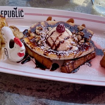 Breakfast Republic - French Toast Sampler with Mr. Presley, Banana Split, and Strawberry & Mascarpone. - Breakfast & Brunch Near Me - Culver City, California Breakfast Republic - French Toast Sampler with Mr. Presley, Banana Split, and Strawberry & Mascarpone. - Breakfast & Brunch Near Me - Culver City, California