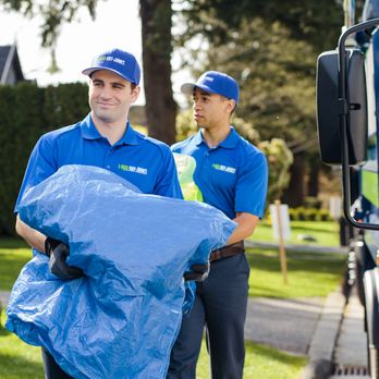 1-800-GOT-JUNK? Gainesville - 1-800-GOT-JUNK? Truck team carrying trash bags - Junk Removal & Hauling Near Me - Ocala, Florida