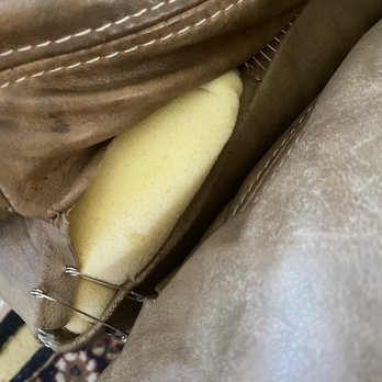 Mobile Leather Pro - Before pic:  The leather seam is torn - Furniture Reupholstery Near Me