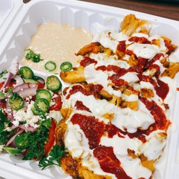 a meal in a styrofoam container