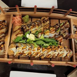 Sushi Pirate - One both sides is the dragon roll. Top to bottom of the center: godzilla roll, crispy eal roll(I think that's the name), rock and roll.