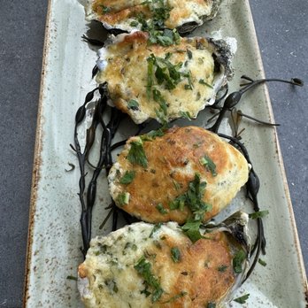Bluewater Grill - Oysters Rockefeller - Overdosed with Romano Cheese and more salt, zero bacon.  Barely finished two. Horrible - Seafood Near Me - Santa Barbara, California