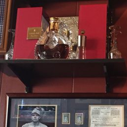 a bottle of bourbon and a glass