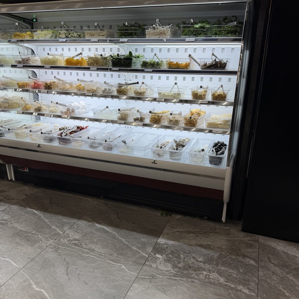 Fresh veggies well stocked seafood and noodles Fresh veggies well stocked seafood and noodles