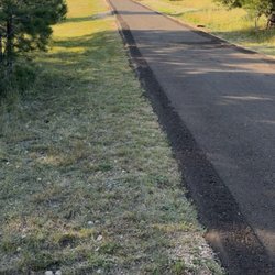 First Class Asphalt - This customer was sick of dust and dirt a lot of potholes we installed a crushed asphalt 4 inch layer and compact