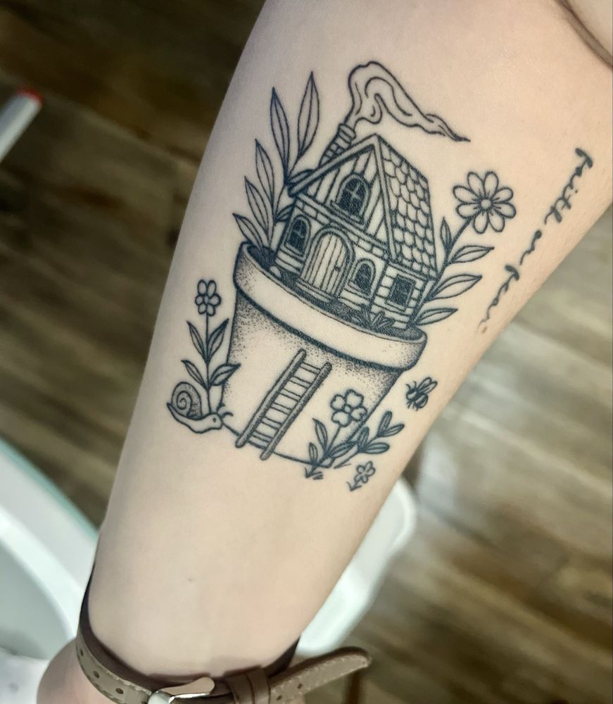 Momentum Tattoo Logo