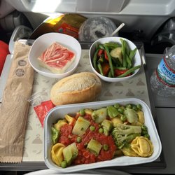 Iberia - In flight meal dinner was pasta and cold vegetables!! And with a little salt and pepper the food is okay. The bread was very soft.
